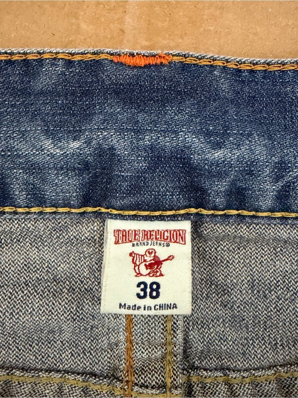 True Religion contrast denim shorts, distressed blue wash and raw, frayed hem 38